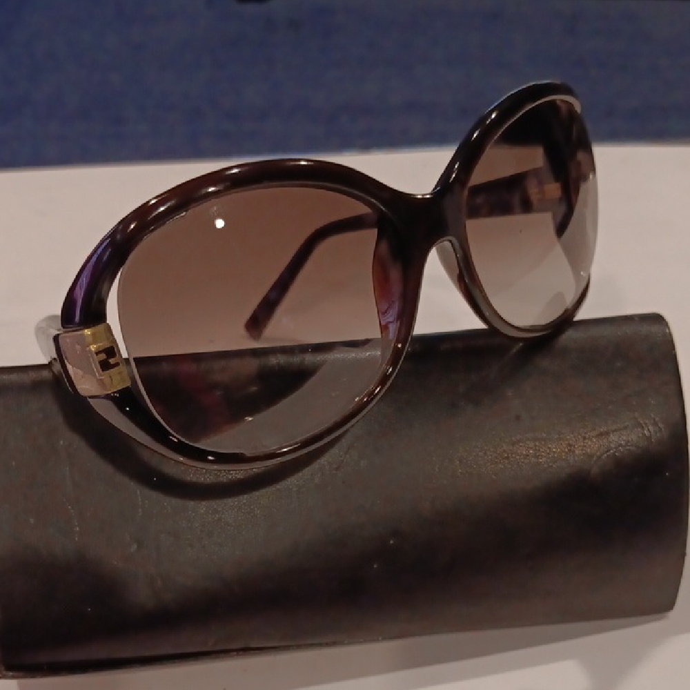 Authentic Fendi Oval Shape Black on black with silver Hardware sunglasses